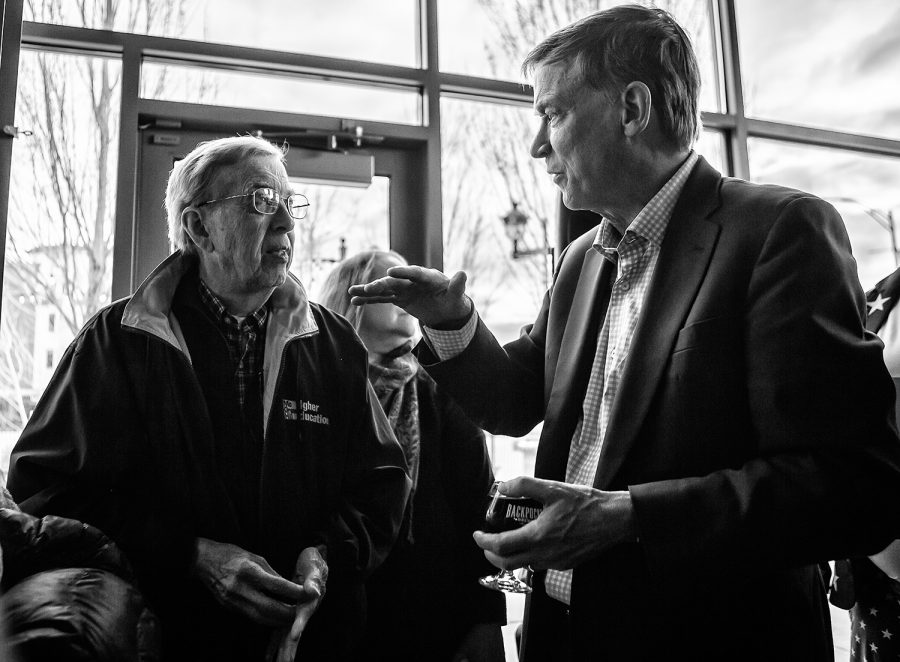 Former Colorado Gov. John Hickenlooper meets with supporters at Backpocket Brewery in Coralville on Friday, April 12, 2019.