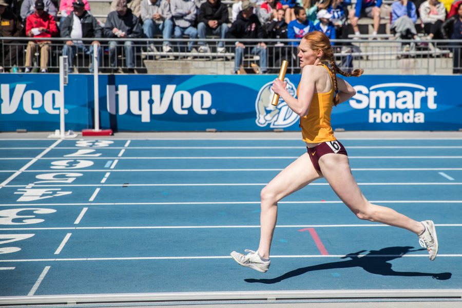 Minnesota's Patty O'Brien crosses the finish line during the university women's 4x1600m race at the 2019 Drake Relays in Des Moines, IA, on Friday, April 26, 2019.