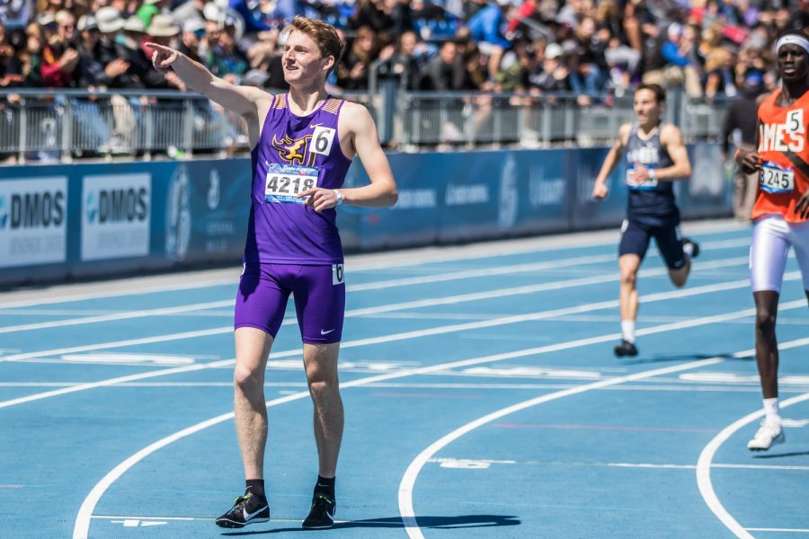 Johnston High School's Joe Schaefer celebrates his win in the boys' 800m race at the 2019 Drake Relays in Des Moines, IA, on Friday, April 26, 2019.