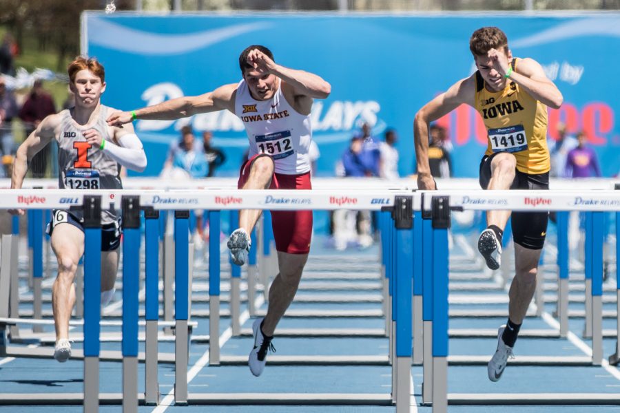 Athletes jump during the men's 110m hurdles at the 2019 Drake Relays in Des Moines, IA, on Friday, April 26, 2019.