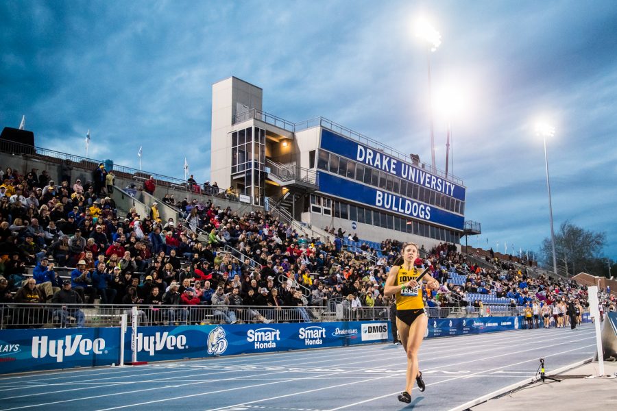 Iowa's Mallory King runs across the finish line in the women's 4x800m race at the 2019 Drake Relays in Des Moines, IA, on Friday, April 26, 2019. Iowa earned second in the event with a time of 8:31.84.