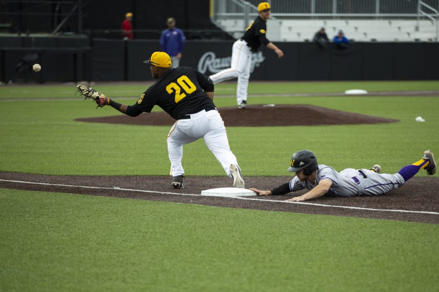 Iowa first baseman Izaya Fullard attempts to tag out a runner at a baseball game between the Hawkeyes and Western Illinois at Duane Banks Field, on Wednesday, on May 1, 2019. The Hawkeyes beat the Leathernecks 8-7.