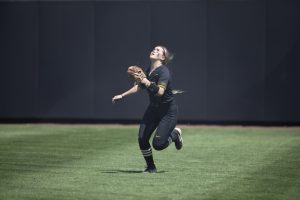 Iowa infielder Cameron Cecil runs before catching the ball during the game against Ohio State at the Bob Pearl Softball field on Saturday, May 4, 2019. The Hawkeyes were defeated by the Buckeyes 0-10.