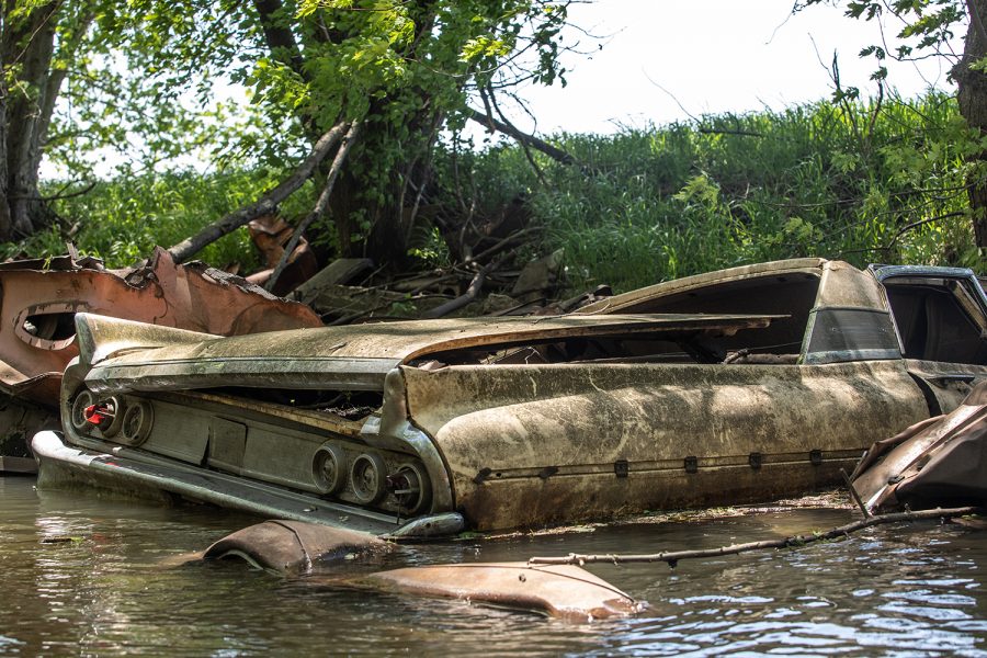 A vintage car protects the riverbank along the Iowa River east of Dows, Iowa, on May 23, 2019. The car was one of several lined along the riverbank in the area. 