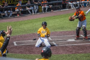 Iowa infielder Mitchell Boe celebrates after hitting a home run during baseball Iowa vs. Oklahoma State at Duane Banks Field on May 6, 2018. 