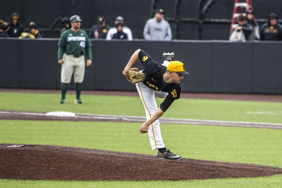 Iowa pitcher Cam Baumann throws the ball during the baseball game against Michigan State at Duane Banks Field on Saturday, May 11, 2019. The Spartans defeated the Hawkeyes 9-4.