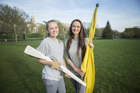 Color Guard Club Vice President, Haley Burton (left), and President, Joslyn Hagener, pose for a portrait at Hubbard Park on Monday, April 29, 2019. The new club will start classes and practices next fall for students of all experience levels to join.