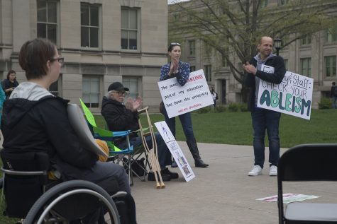 Attendees clap after one of the volunteering speakers on the Pentacrest on Wednesday, May 1, 2019. UI Students for Disability Advocacy & Awareness organized this rally to speak about the injustice that students with disabilities face on campus.