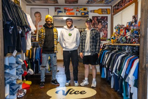 (From left) Demetrius Perry, Peter Krogull, and Tony Casella pose for a portrait at their store Vice in Iowa City on Wednesday, May 8, 2019. Vice sells streetwear and vintage clothing to the Iowa City community, and online through their e-Bay page. In April Perry, Krogull, and Casella started a podcast about sneakers, fashion, and the fashion culture of Iowa City.