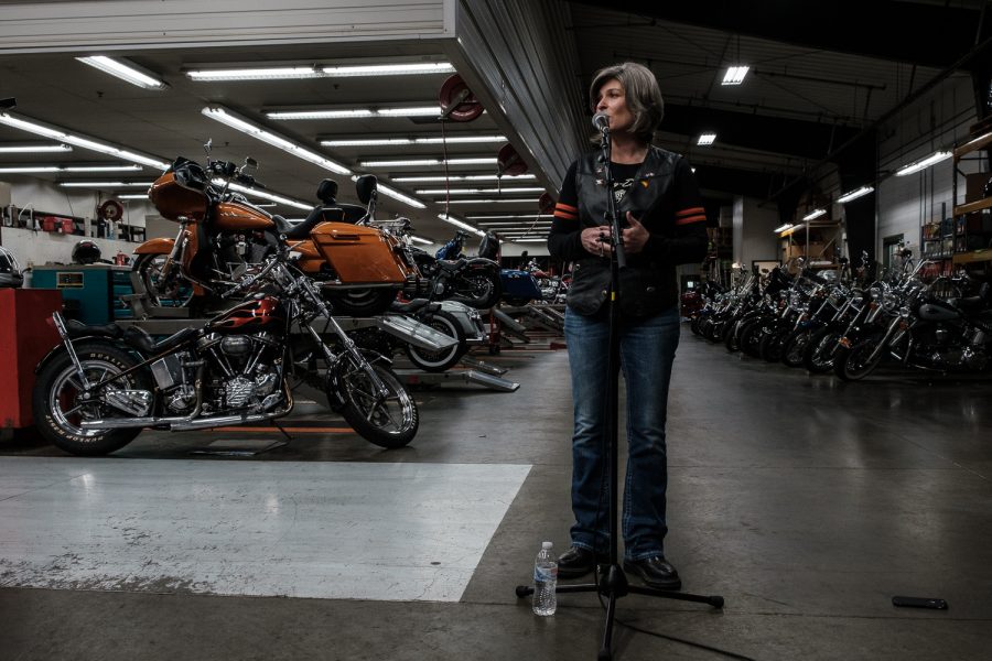 Senator Joni Ernst, R-Iowa speaks to members of the press before her annual Roast and Ride event at the Harley Davidson Big Barn repair shop in Des Moines on Saturday, June 15, 2019. Bikers rode from Des Moines to a pork roast in Boone, Iowa. During the roast, Senator Ernst started her campaign for reelection.   (Wyatt Dlouhy/The Daily Iowan)
