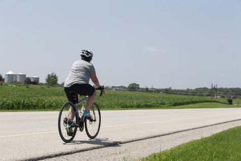 A cyclist rides toward North Liberty during the Big Rove bicycle event on Saturday, June 29, 2019. 