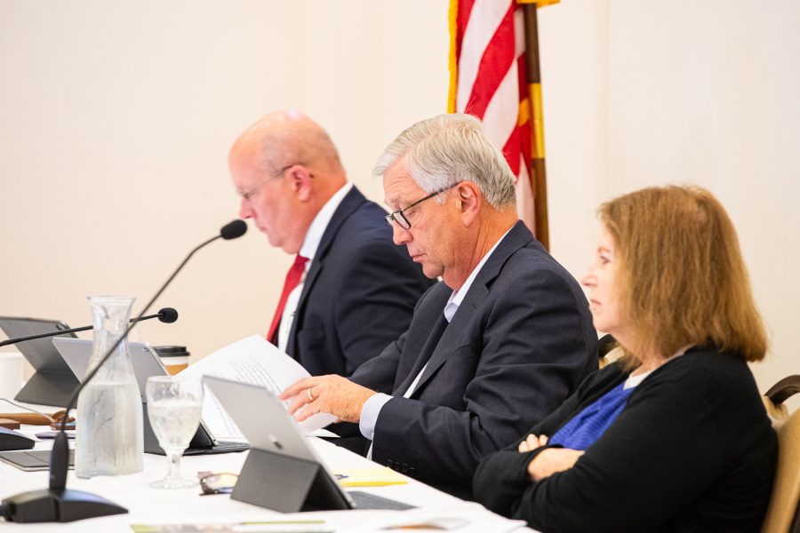 Iowa Board of Regents President Michael Richards sits alongside President Pro Tem Patty Cownie during a meeting at the Iowa State Alumni Center in Ames, Iowa, on Thursday, June 6, 2019. The Regents voted in favor of a four percent tuition increase starting in the fall semester of 2019.