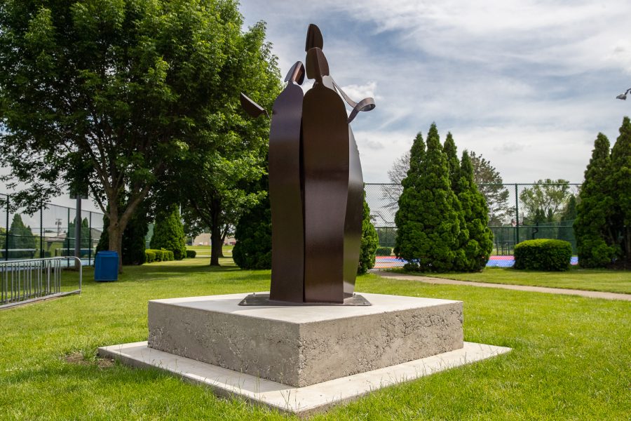 A statue dedicated to UI student Mollie Tibbetts is seen at Ahrens Park in Grinnell, Iowa on June 6, 2019. The statue created by Dubuque artist Gail Chavenelle was installed May 18, 2019. 