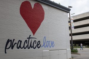 A new mural is seen on the side of Hothouse Yoga on June 22, 2019. 