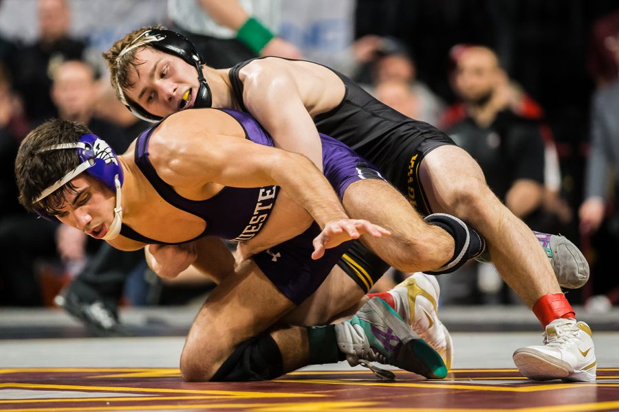 Iowas+125-lb+Spencer+Lee+wrestles+Northwesterns+Sebastian+Rivera+during+the+fourth+session+of+the+2019+Big+Ten+Wrestling+Championships+in+Minneapolis%2C+MN+on+Saturday%2C+March+9%2C+2019.+Rivera+won+by+sudden+victory%2C+6-4%2C+and+finished+first+in+his+weight+class.+%28Shivansh+Ahuja%2FThe+Daily+Iowan%29