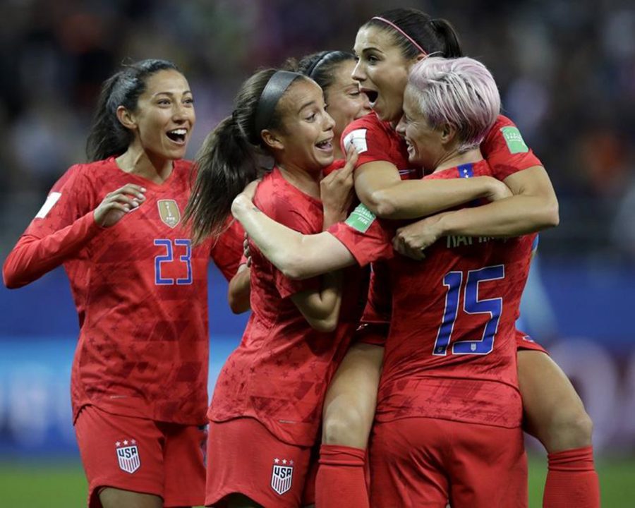 Alex Morgan of the United States celebrates with teammates after scoring her fifth goal in Tuesday's 13-0 win over Thailand in the Women's World Cup Group F soccer match in Reims, France.  Volkswagen's new "Inspire'' spot features  Morgan, a living embodiment of "Drive Bigger'' for how she uses her platform to look out for the next generation of players and give back to the community. [ALESSANDRA TARANTINO]