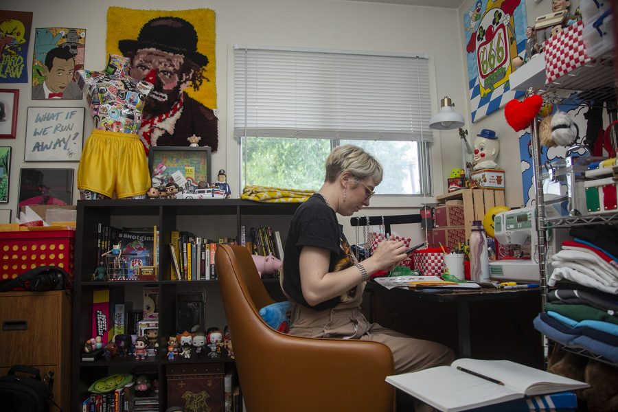 Artist Katie Gallegos in her office at her apartment in Coralville on July 22, 2019. Gallegos sells her jewlery, thrifted clothes and stickers at various stores throughout Iowa and online. 