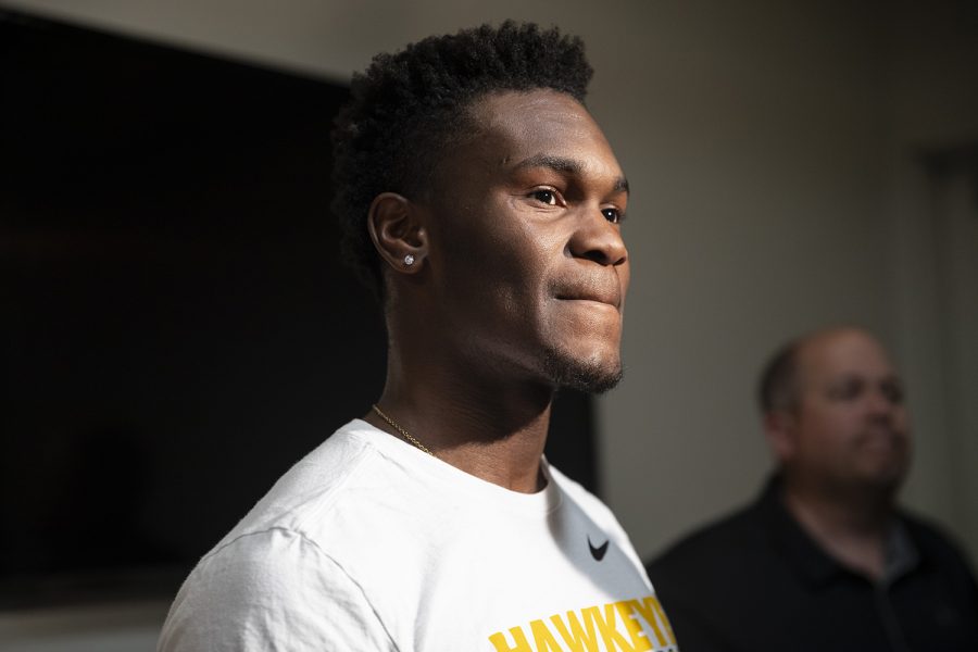 Joe Toussaint speaks with members of the press during an Iowa men’s basketball media availability at Carver-Hawkeye Arena on July 24, 2019. (Katie Goodale/The Daily Iowan)