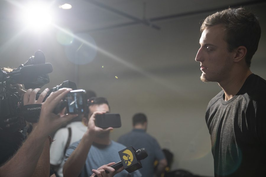 Jack Nunge speaks with members of the press during an Iowa men’s basketball media availability at Carver-Hawkeye Arena on July 24, 2019. (Katie Goodale/The Daily Iowan)