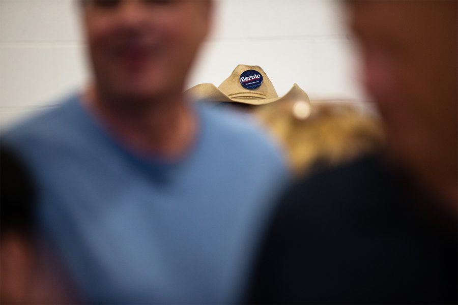 A supporter with a Sanders button on a cowboy hat during an ice cream social, Tuesday, July 2, 2019, at the Robert A. Lee Recreation Center in Iowa City, Iowa.
