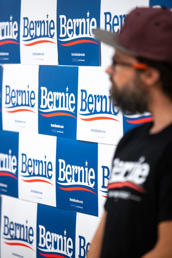 A supporter watches U.S. Sen. Bernie Sanders, I-Vermont, speaks to supporters during an ice cream social, Tuesday, July 2, 2019, at the Robert A. Lee Recreation Center in Iowa City, Iowa.