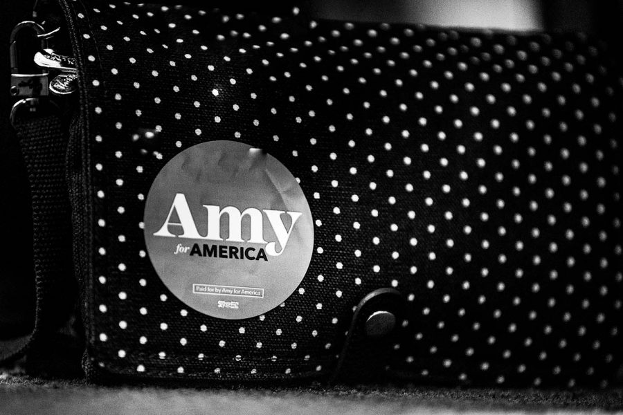 A purse with a Amy for America sticker on it at the 2019 Midwest School for Woman Workers at The Hilton Garden Inn in Iowa City on Thursday July 25, 2019.
