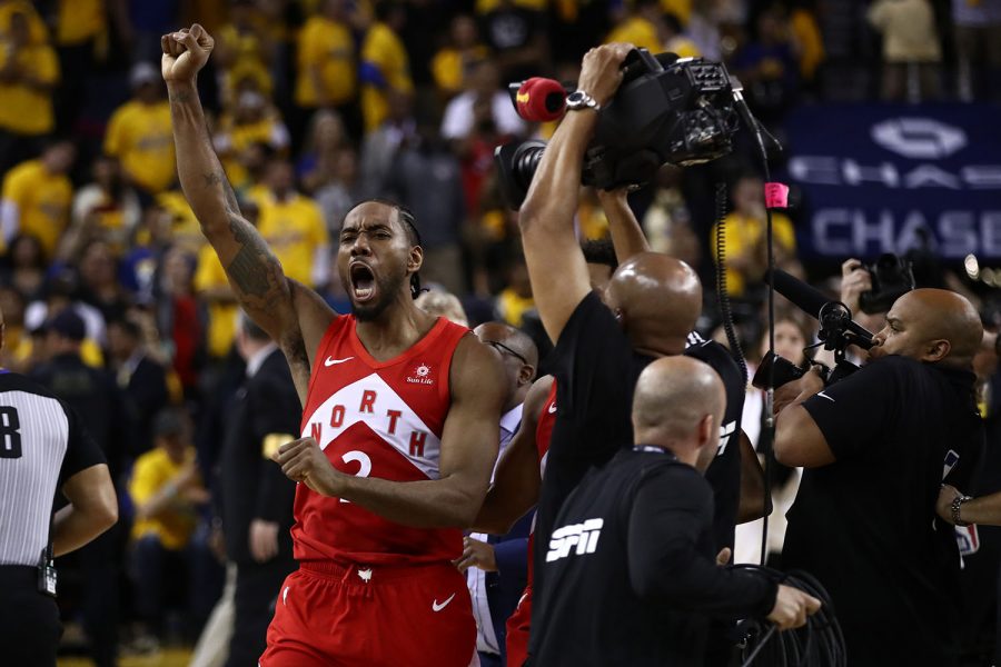 Kawhi Leonard of the Toronto Raptors celebrates his team's win against the Golden State Warriors to capture the NBA championsip at ORACLE Arena in Oakland, Calif., on June 13, 2019. (Ezra Shaw/Getty Images/TNS) **FOR USE WITH THIS STORY ONLY**