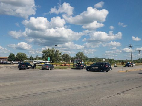 Iowa City police respond to the scene where an officer-involved shooting reportedly occurred near 11 Highway West on July 29, 2019.