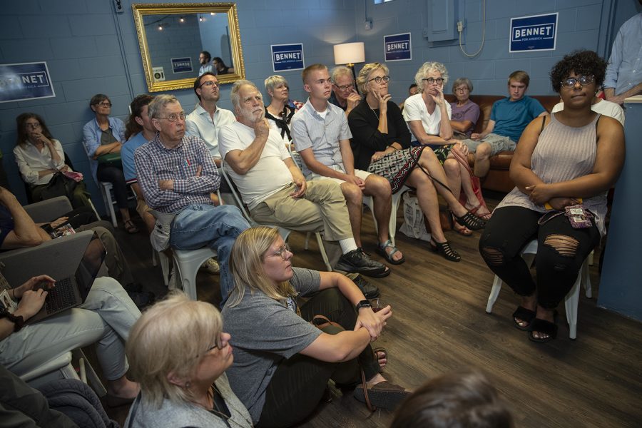 Supporters listen as Senator Michael Bennet, D-CO, speaks during a meet and greet at Wild Culture Kombucha on July 15, 2019. (Katie Goodale/The Daily Iowan)