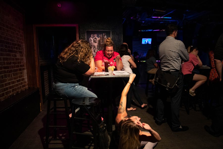 An attendee falls down from laughter at the Sen. Kamala Harris, D-N.Y watch party in Studio 13 on July 31, 2019.  (Roman Slabach/The Daily Iowan)