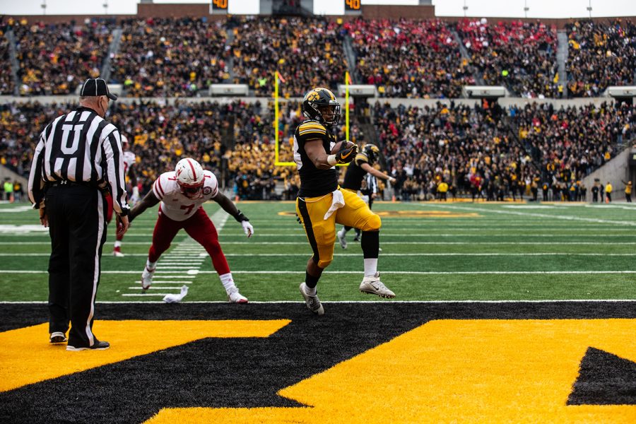 Toren Young enters the end zone during the Iowa vs. Nebraska game on Friday, November 23, 2018. Iowa defeated the Huskers 31-28.