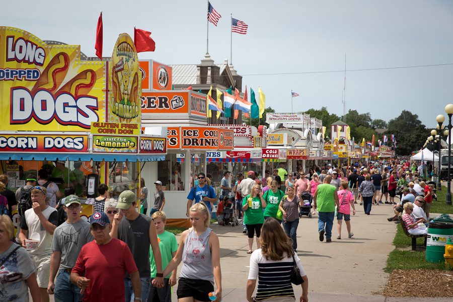 Visitors walk past food vendors Aug. 13, 2015, at the Iowa State Fair in Des Moines, Iowa. (Scott Morgan/McClatchy DC/TNS)