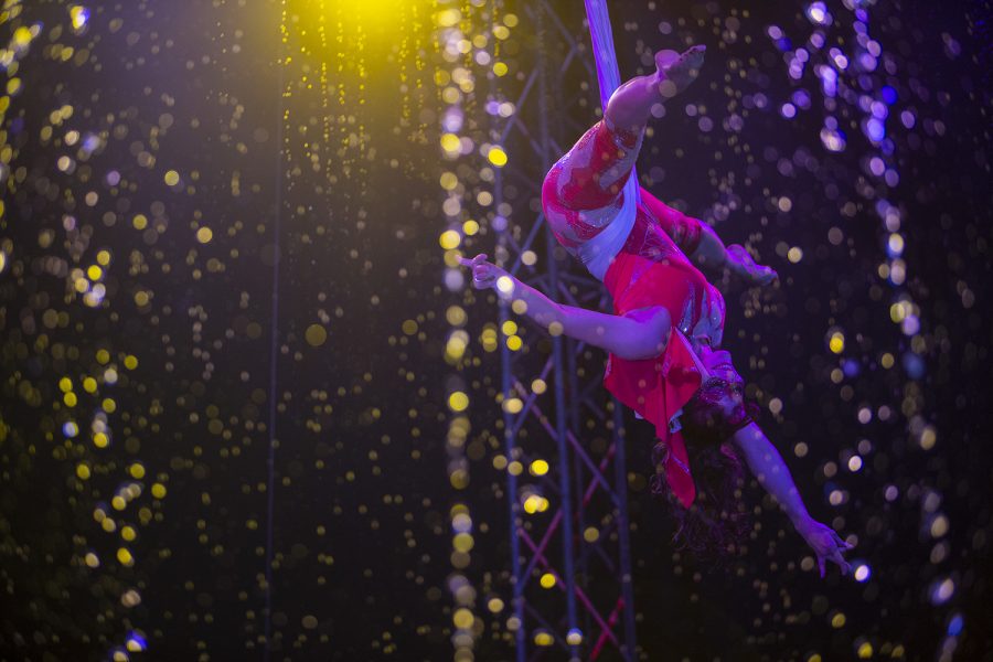 Elena Stefanova performs in an aerial sling during Cirque Italia’s first night of performances at Coral Ridge Mall in Coralville on Aug. 1, 2019. Cirque Italia performs with a stage which holds 35,000 gallons of water. 