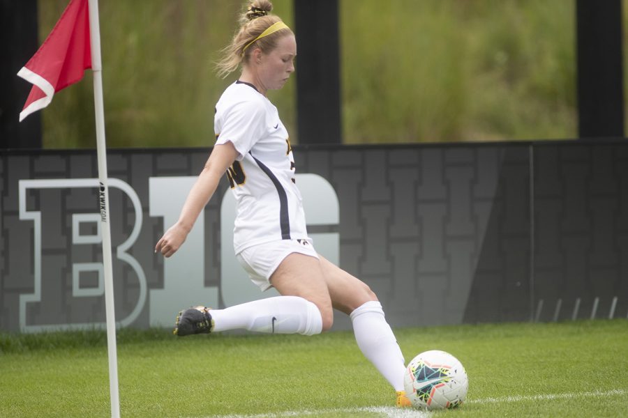 Iowa’s Natalie Winters completes a corner kick during a match against the University of Northern Iowa Panthers on Sunday, August 25, 2019. The Hawkeyes defeated the Panthers 6-1.