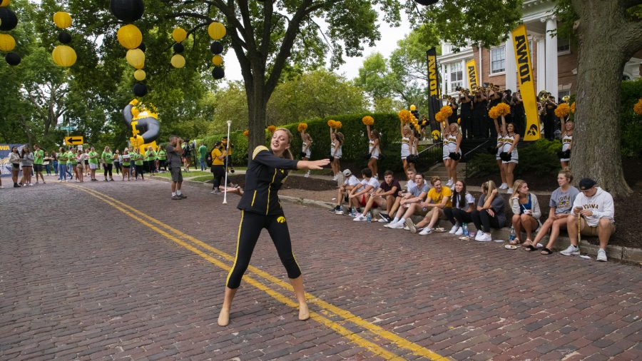 The University of Iowa spirit squad and marching band perform at the President’s Block Party on Sunday, August 25th, 2019. The President’s Block Party is a tradition where University President, Bruce Harreld hosts a block party in front of his home. 