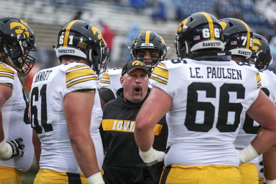 Iowa+offensive+line+coach+Tim+Polasek+speaks+with+players+before+Iowas+game+against+Penn+State+at+Beaver+Stadium+on+Saturday%2C+October+27%2C+2018.+The+Nittany+Lions+defeated+the+Hawkeyes+30-24.