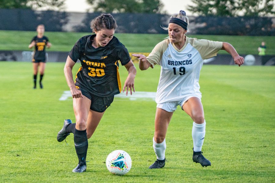 Iowa forward Devin Burns evades the defense during a women's soccer match between Iowa and Western Michigan on Thursday, August 22, 2019. The Hawkeyes defeated the Broncos, 2-0.