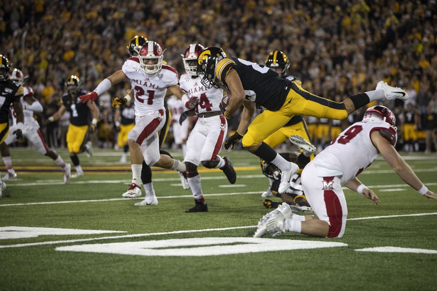 Iowa wide receiver Nico Ragaini attempts to avoid the defense during Iowa football vs. Miami (Ohio) at Kinnick Stadium on Aug. 31, 2019. Iowa defeated the Miami (Ohio) 38-14.