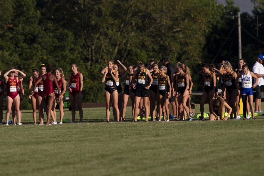 Runners prepare to start the 4000 meter race during the Hawkeye Invitational on Friday, Sept. 6, 2019 at the Ashton Cross Country Course. The Hawkeyes prevailed over six other teams to win first place overall in the men’s and women’s races. Iowa State University runner Abby Caldwell finished in first place with a time of 14:02.