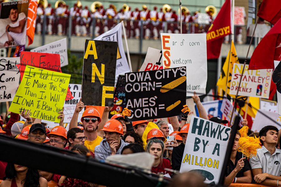 Signs are held by spectators during ESPN College GameDay before the annual Cy-Hawk football game between Iowa and Iowa State in Ames, IA on Saturday, September 14, 2019. This was GameDay's first visit to Ames. 