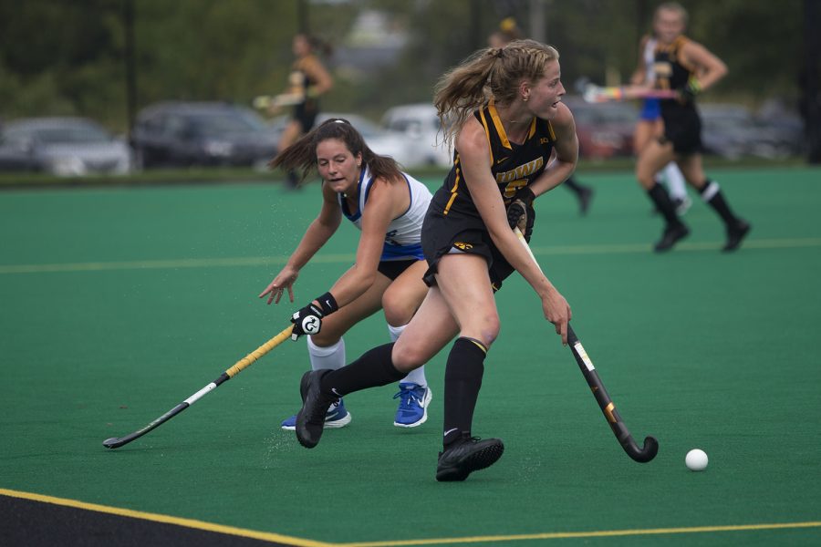 Iowa midfielder Sofie Stribos runs with the ball during a field hockey game between Iowa and Duke at Grant Field on Sunday, September 15, 2019. The Hawkeyes were defeated by the Blue Devils, 2-1 after two overtime periods.