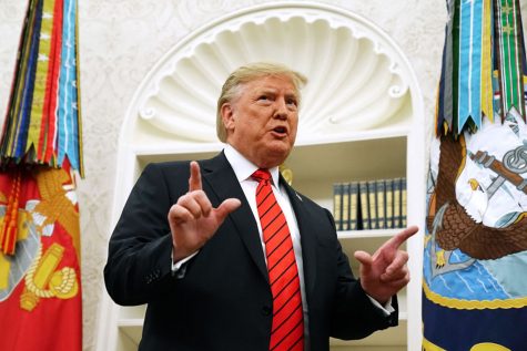 U.S. President Donald Trump gives pauses to answer a reporterss question about a whistleblower as he leaves the Oval Office after hosting the ceremonial swearing in of Labor Secretary Eugene Scalia at the White House September 30, 2019 in Washington, DC. (Chip Somodevilla/Getty Images/TNS)