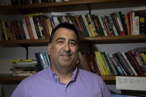 Darrel Wanzer-Serrano poses for a portrait in his office in the Becker Communication Studies building on Sept. 4, 2019. The UI Latino Studies Program received a grant in order to build up their Imagining Latinidades seminars.