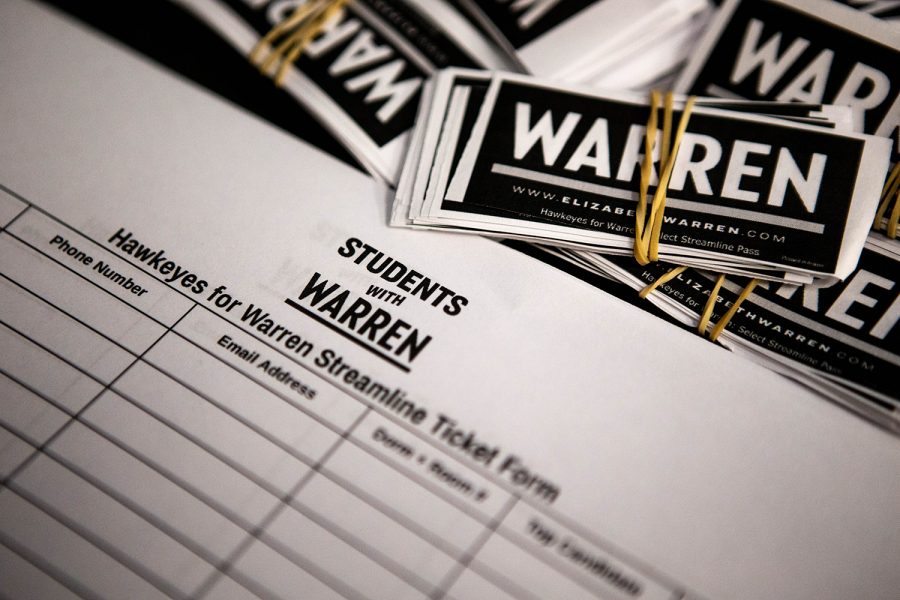 Warren stickers are seen during a Hawkeyes for Warren meeting at the Iowa City Public Library on Wednesday, September 4, 2019. (Megan Nagorzanski/The Daily Iowan)