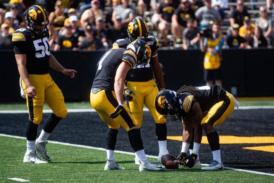 Iowa WR Devonte Young stops the ball after a punt during a football game between Iowa and Rutgers at Kinnick Stadium on Saturday, September 7, 2019. The Hawkeyes defeated the Scarlet Knights 30-0. 