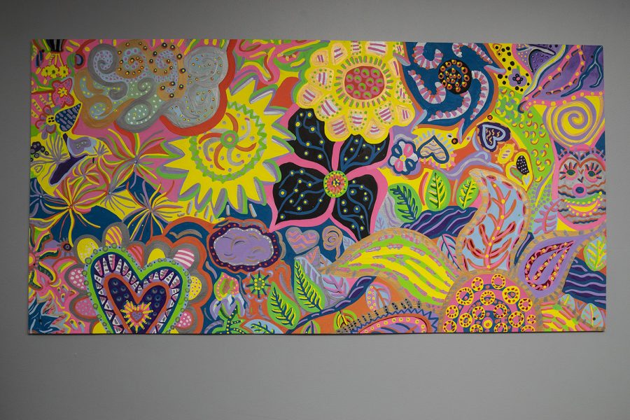 One of the five murals hangs during a meet and greet for the new art instillation Everyday Joy in the Stead Family Children’s Hospital on Aug. 29, 2019. Over 300 children worked on this project that celebrates the memory of Mollie Tibbetts.