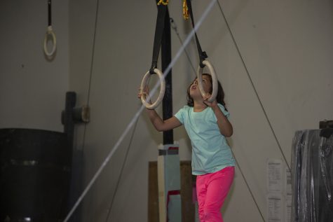 Emilia Cryer plays during a class at Gym Nest in Iowa City on Sunday, Sept. 8, 2019. Gym Nest has begun offering gym classes to children on the autism spectrum and their siblings. 