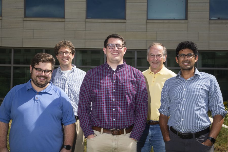 Researchers Philip Polgreen (top left), Jacob Simmering (bottom left), Jordan Schultz (center), Michael Welsh (top right) and Kumar Narayanan (bottom right) pose for a portrait outside of the Pappajohn Biomedical Discovery Building on Monday Sept. 16, 2019. (Katie Goodale/The Daily Iowan)