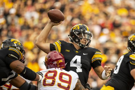 Iowa quarterback Nate Stanley throws under pressure during Iowas game against Iowa State at Kinnick Stadium on Saturday, September 8, 2018. The Hawkeyes defeated the Cyclones 13-3.