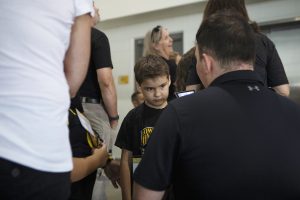 Kid Captain Jackson Tijerina talks to a reporter at Kids Day at Kinnick on Saturday, August 10, 2019. Kids Day at Kinnick is an annual event for families to experience Iowas football stadium, while watching preseason practice and honoring this years Kid Captains.